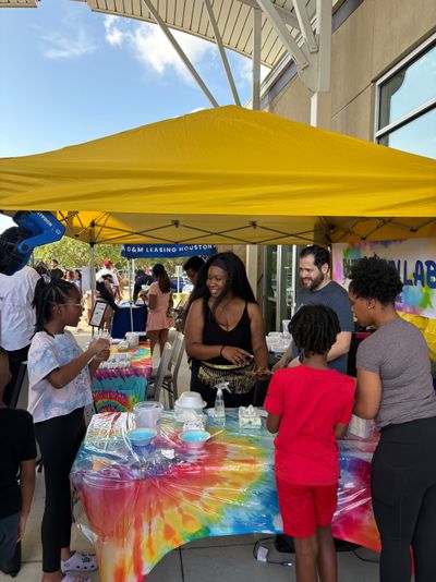 Duran Fun Lab family team at a community activity station